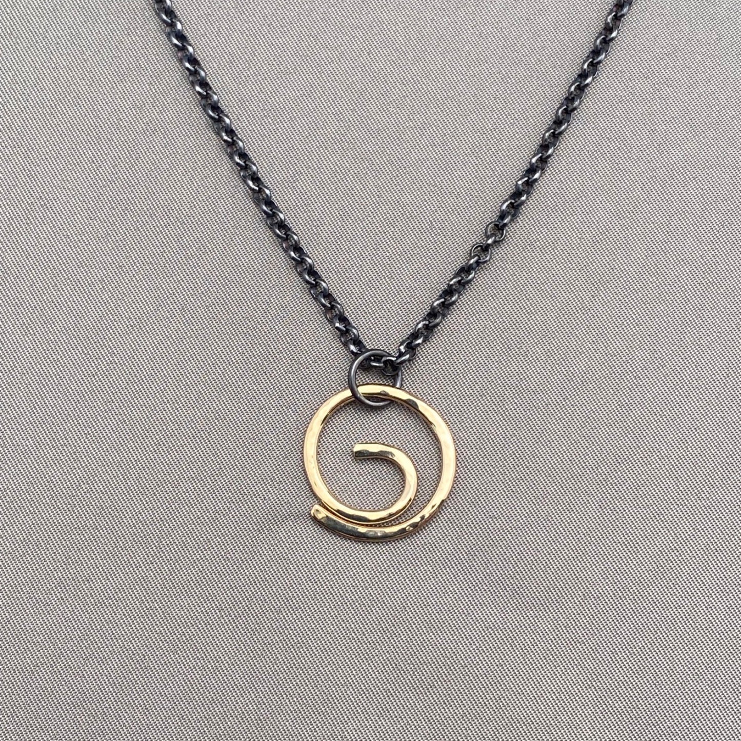 Center of it All Energy Swirl Necklace