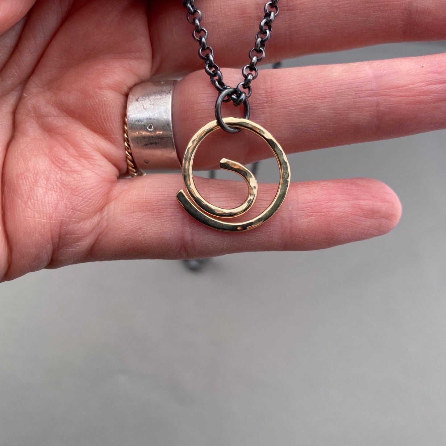 Center of it All Energy Swirl Necklace