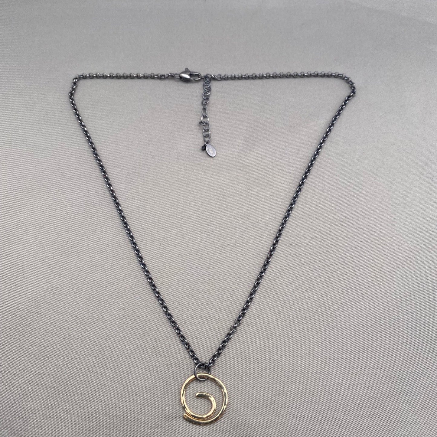 Center of it All Energy Swirl Necklace