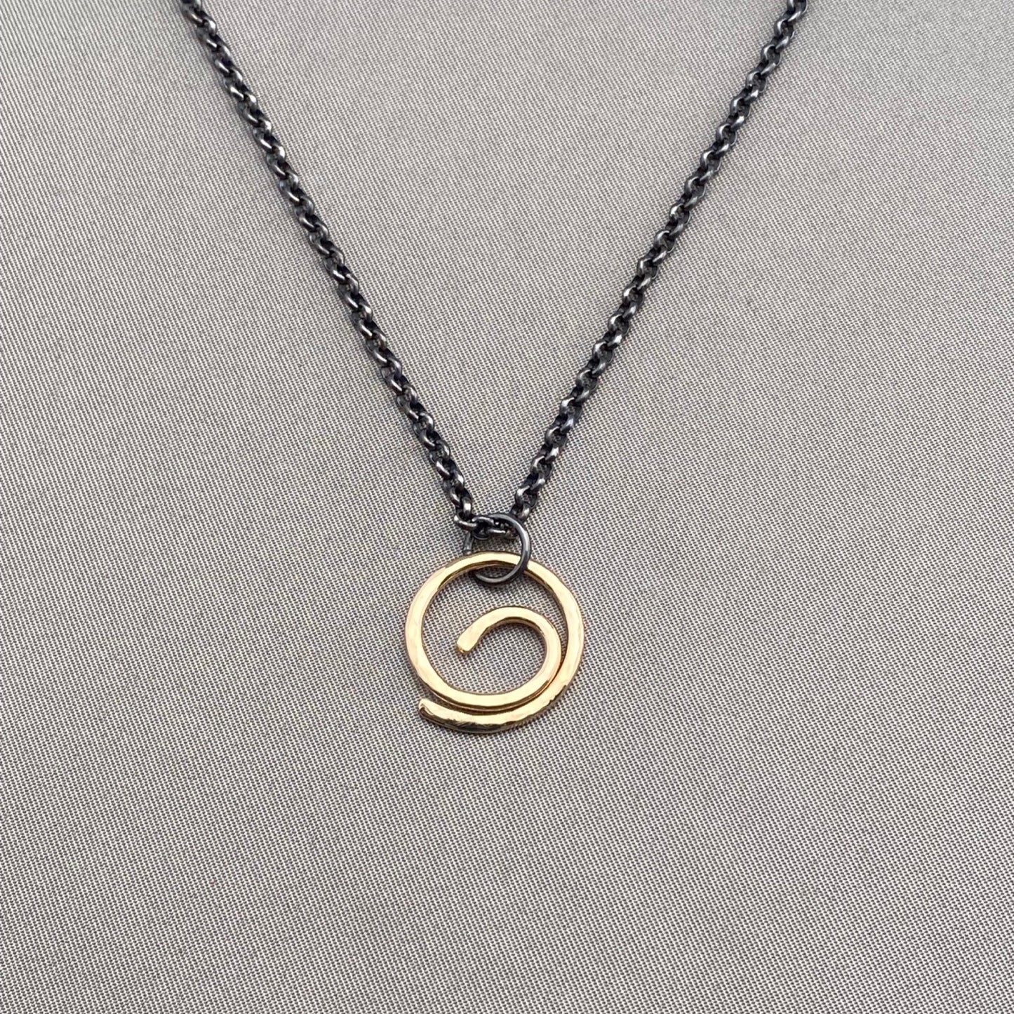 Center of it All Energy Swirl Necklace